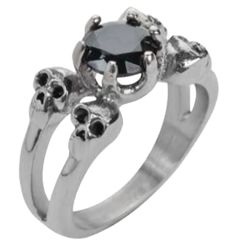A stainless steel ring with a black cubic zirconia center stone and skull motifs on the sides.