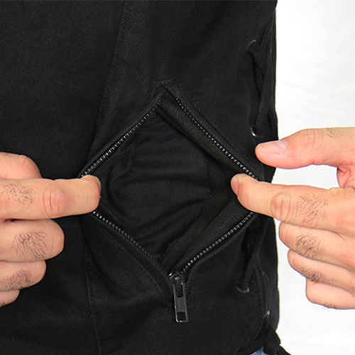 Close-up of an exterior zippered pocket on the Deadbolt Denim Vest