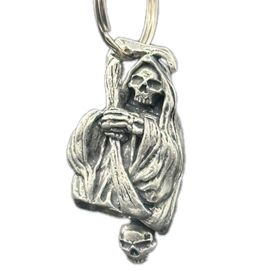 A silver-colored bell with a Grim Reaper figure, crafted from lead-free pewter, designed for mounting on a vehicle.
