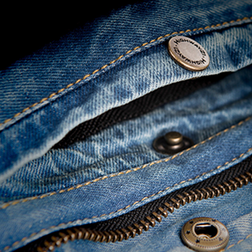 Menโs denim motorcycle vest with concealed carry pocket