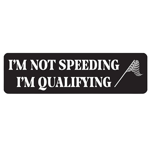 Black helmet sticker with white text reading I'm not speeding I'm qualifying and checkered flag