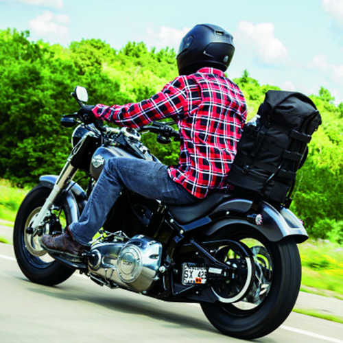 Kuryakyn Momentum Freeloader Duffel mounted on a motorcycle sissy bar