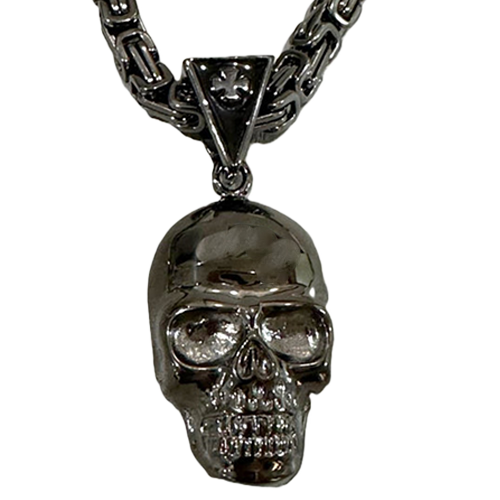 A large black skull pendant necklace on a Byzantine chain.