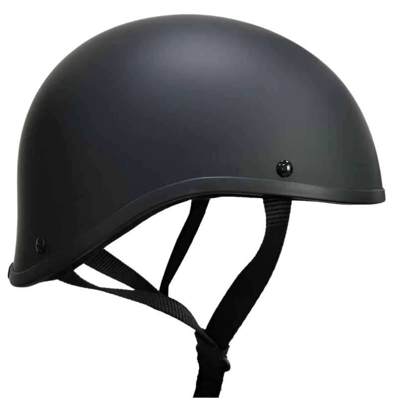 A black beanie-style helmet with quick release straps, designed with a low profile and no visible brand markings.