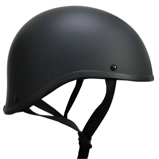 A black beanie-style helmet with quick release straps, designed with a low profile and no visible brand markings.