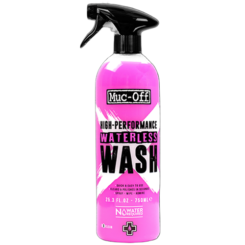 A pink spray bottle of Muc-Off High Performance Waterless Wash designed for cleaning vehicles without water.