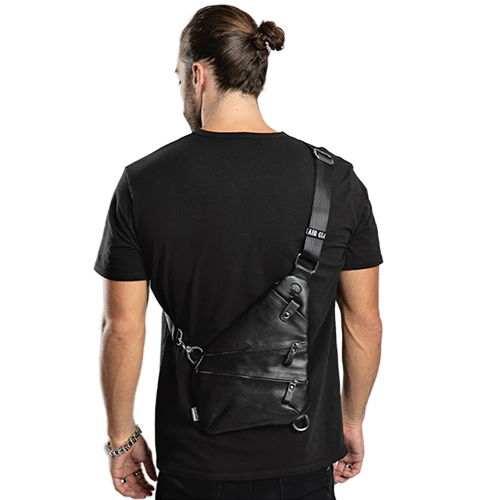 Man wearing a black leather crossbody bag.