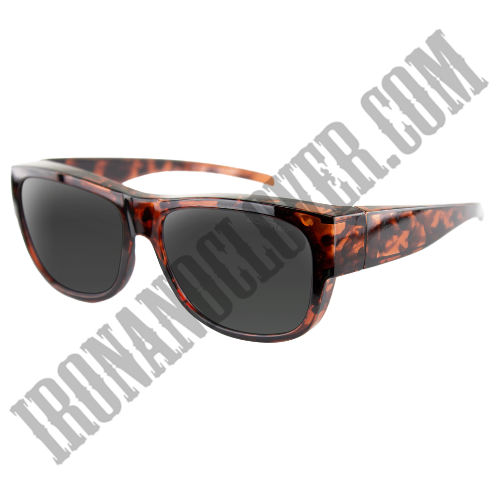 A pair of brown tortoise patterned sunglasses with a gloss finish, designed to be worn over prescription glasses.