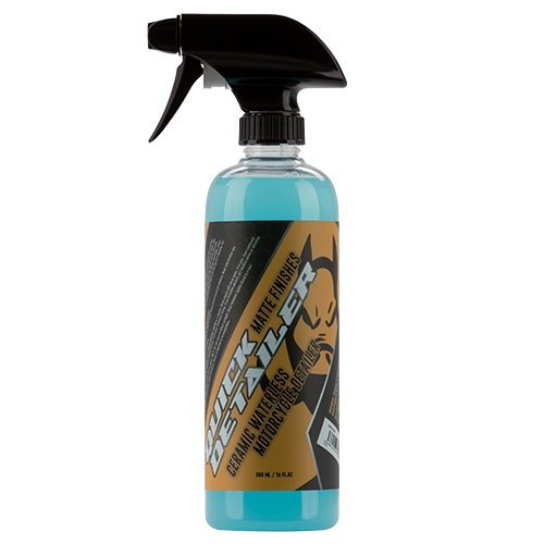 A 16 oz. spray bottle of HOGWORKZ Quick Detailer for Matte Finishes, with a black spray nozzle and a label that includes the product name and branding.