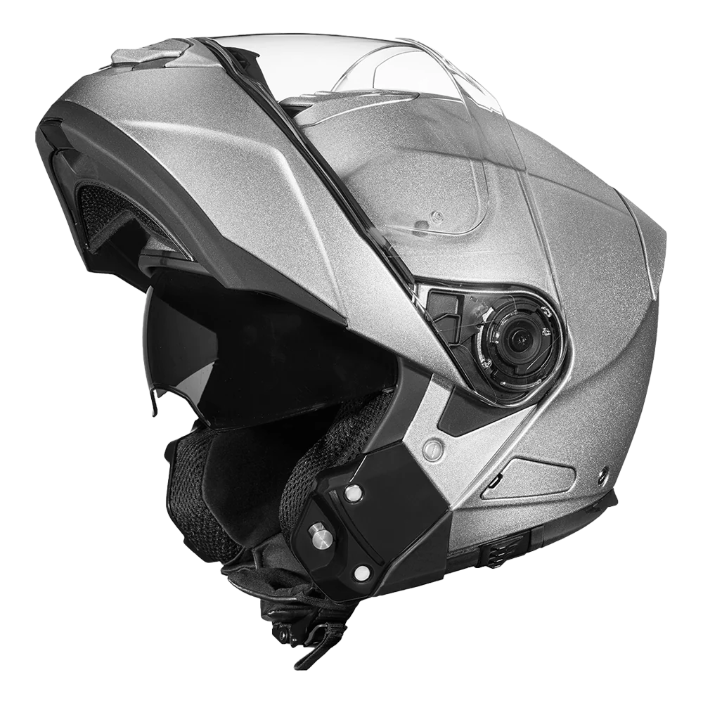 A silver metallic modular motorcycle helmet with dual shields and DOT approval.
