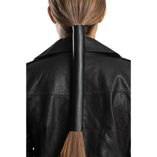 A 12 inch extra wide black leather hair glove securing thick long hair in a ponytail for motorcycle riding