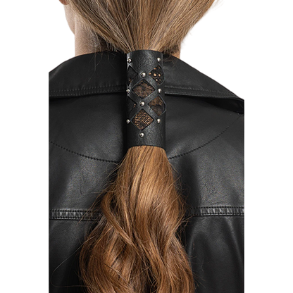 A person wearing a black leather jacket and a 4-inch diamond cut-out hair glove with lace and rivets in the center, holding a ponytail.