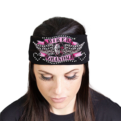 Woman wearing a black Biker Grandma rhinestone headband with pink-and-silver winged motorcycle artwork.