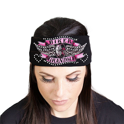 Woman wearing a black Biker Grandma rhinestone headband with pink-and-silver winged motorcycle artwork.