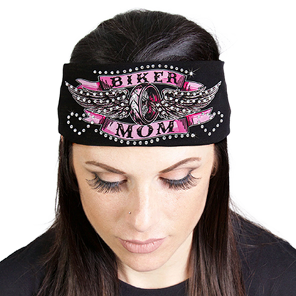 Woman wearing a black headband with pink 'Biker Mom' text and wings design.