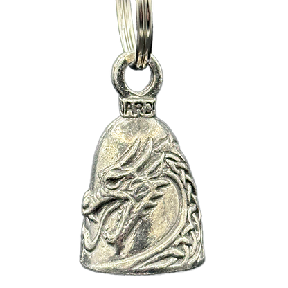 A silver pewter motorcycle bell with a Celtic dragon design.