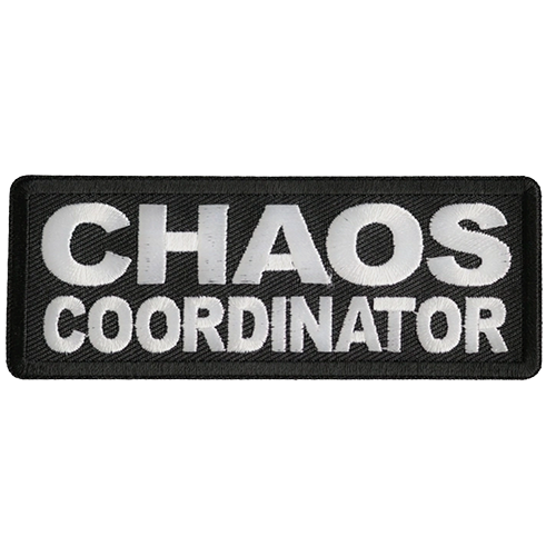 Black embroidered patch with white text reading Chaos Coordinator