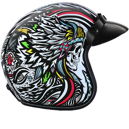 A motorcycle helmet featuring a bold black and white graffiti design with vibrant, colorful accents with a removable visor.