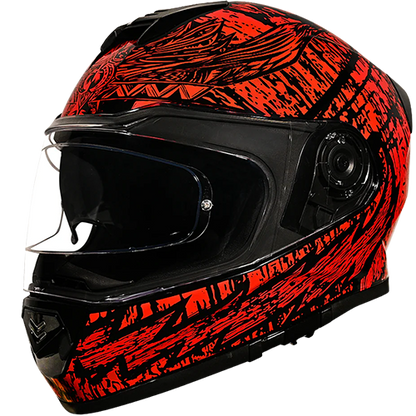 A full face motorcycle helmet with a black and red geometric pattern design, featuring a clear visor and a strap for securing the helmet.