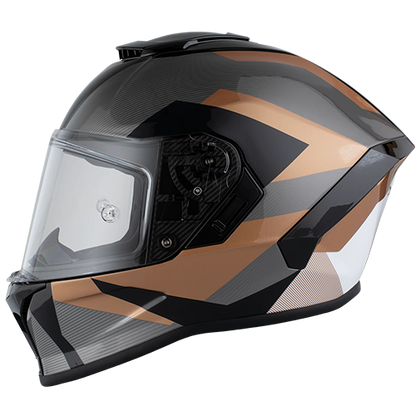 A full face motorcycle helmet with a copper, black, and gray geometric pattern and a clear visor.