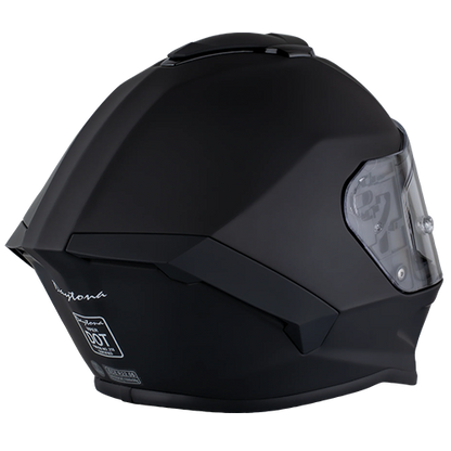 A dull black full-face motorcycle helmet with dual shields and DOT/ECE certification.
