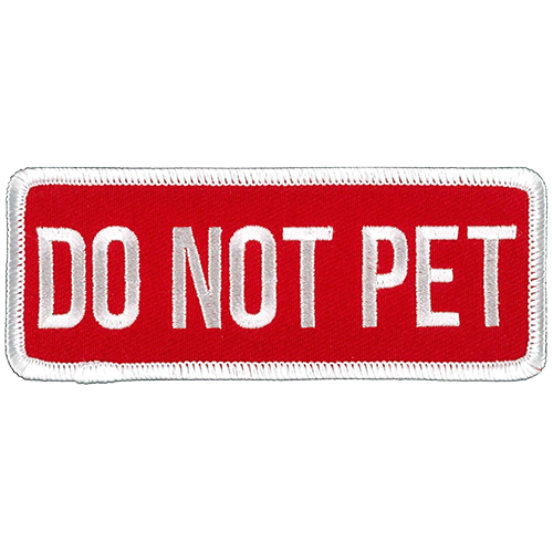 Red rectangular embroidered patch with white “DO NOT PET” lettering and a white stitched border.