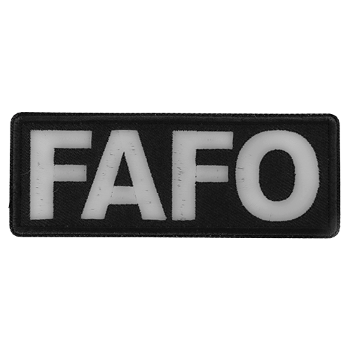 Black embroidered patch with white text reading FAFO measuring 4 by 1.5 inches