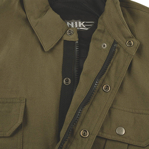 Close-up of an olive green utility jacket with a black inner lining