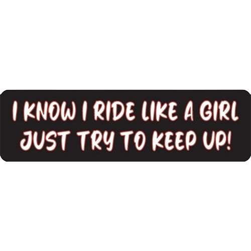 A black helmet sticker with white and red text that reads: 'I KNOW I RIDE LIKE A GIRL JUST TRY TO KEEP UP!'