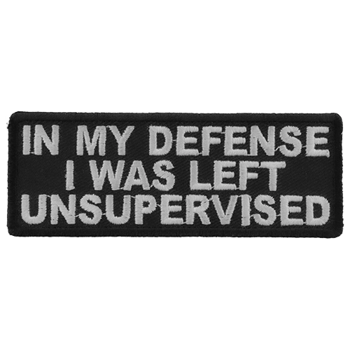 Black embroidered patch with white text reading In My Defense I Was Left Unsupervised measuring 4 by 1.5 inches.