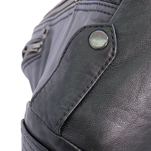 Women’s black leather motorcycle jacket with quilted shoulders and stand-up collar