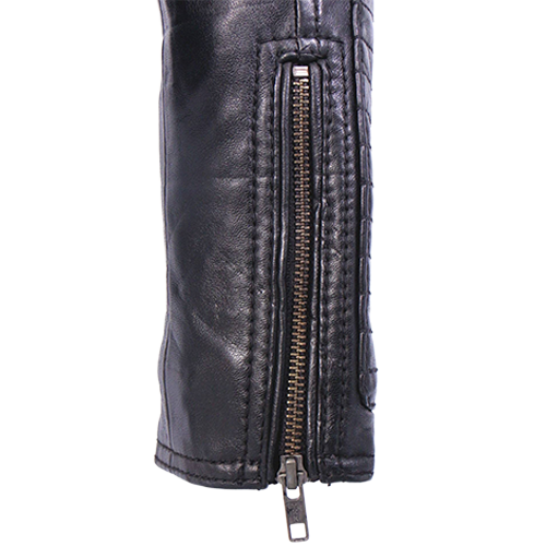 Close-up of antiqued YKK zippers on womens leather jacket cuff