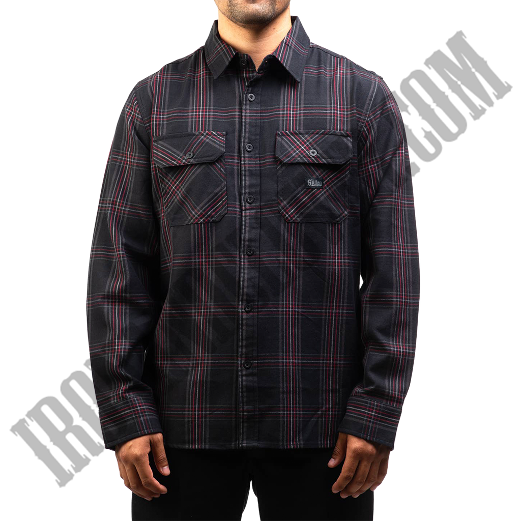 A man wearing a long-sleeved, black, red, and grey plaid flannel shirt.