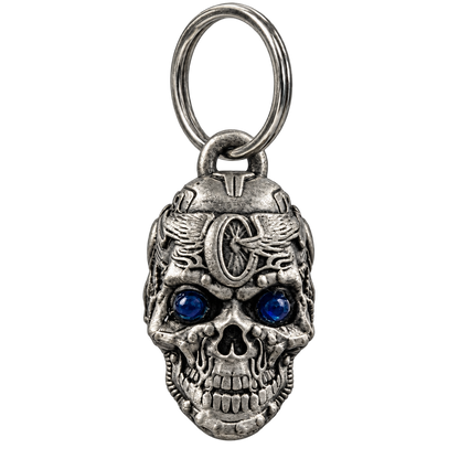 Motorhead mechanical skull motorcycle bell with sapphire-blue eyes shown from the front