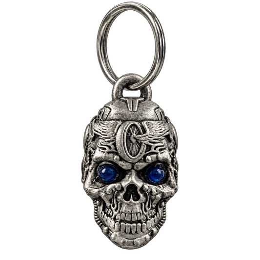 Motorhead mechanical skull motorcycle bell with sapphire-blue eyes shown from the front