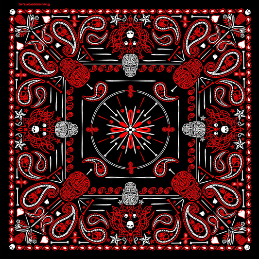 A bandana featuring a geometric pattern with red paisley and skulls against a black background.