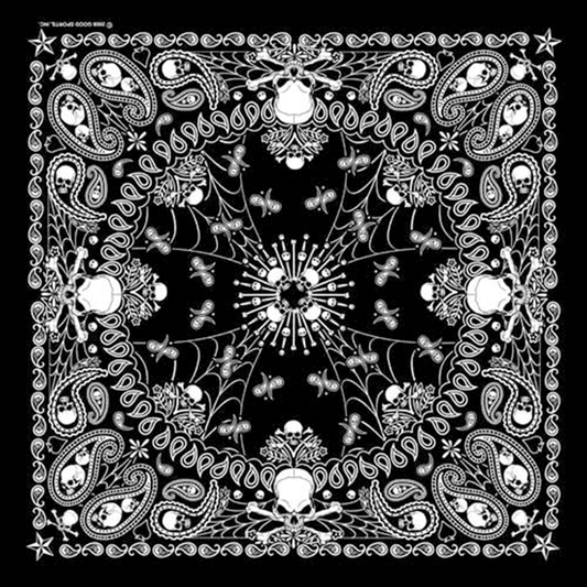 A black and white paisley bandana with skull motifs and rolled-hem edges.