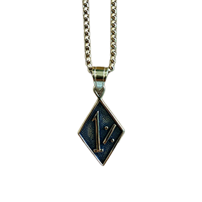 Gold-tone 1%er biker necklace with diamond-shaped 1% pendant.