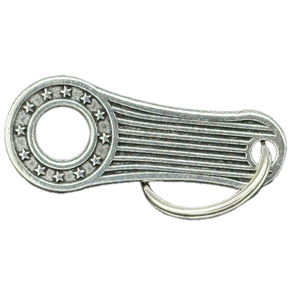 A pewter bell hanger with a patriotic design featuring stars and stripes, including a mounting split ring.