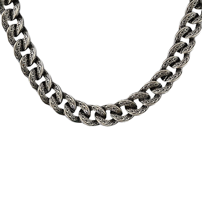 A close-up image of a stainless steel tattoo hook necklace with a chain link design.