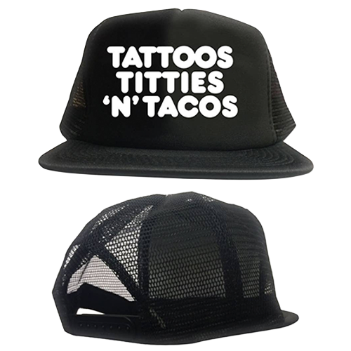 Black trucker hat with white text 'TATTOOS TITTIES 'N' TACOS' on a white background
