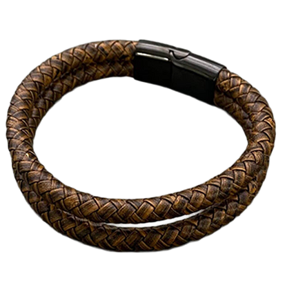 The Backroad brown braided bracelet fastened in a circle with its polished black clasp visible.