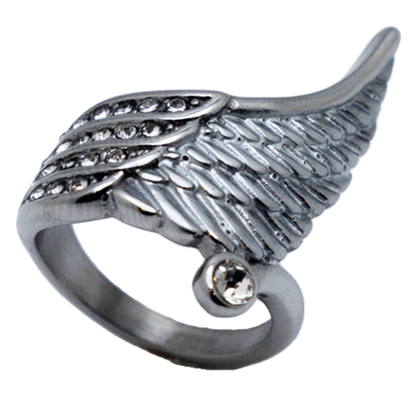 A stainless steel ring with a wing design and multiple channel-set clear stones, featuring an offset round CZ on the side.